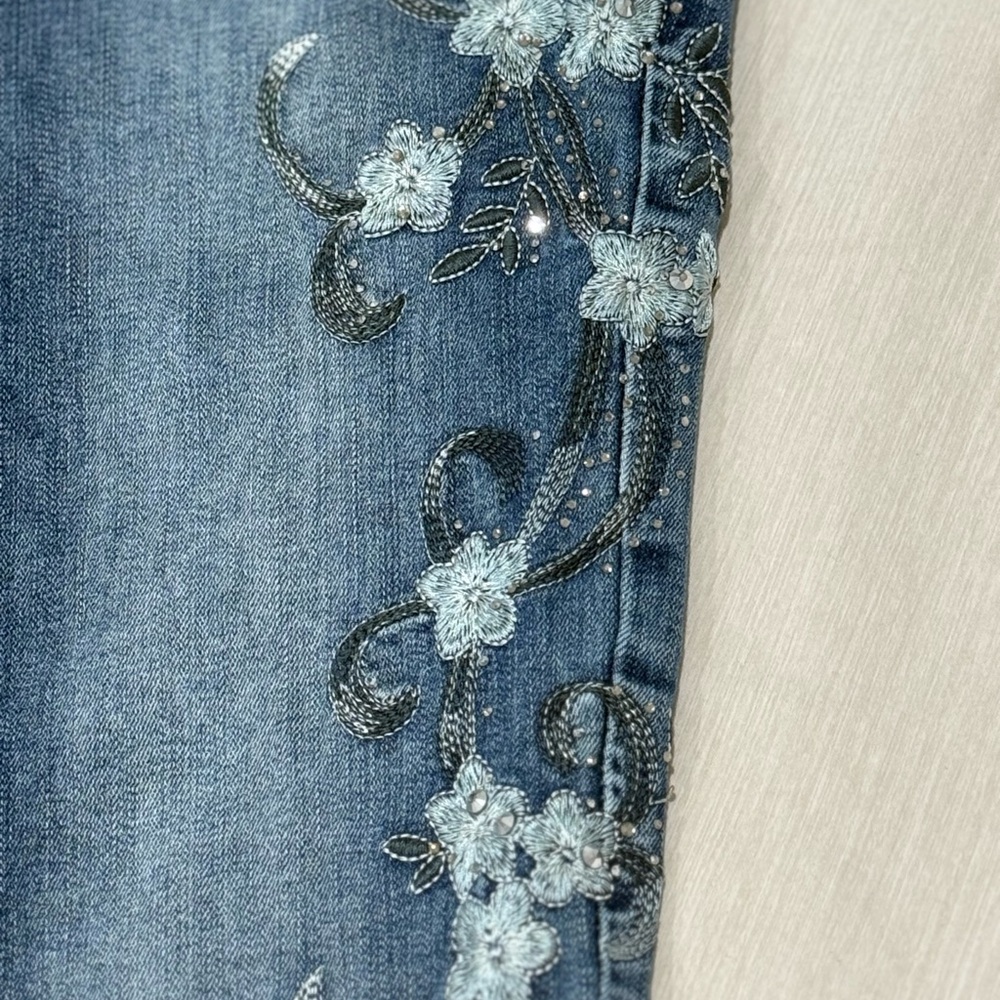 Bebe Blue Skinny Jeans with Floral Embellishments